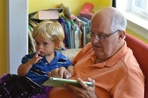 Everett And Grandpa Playing With Grandpas Ipad Joe Shlabotnik Flickr