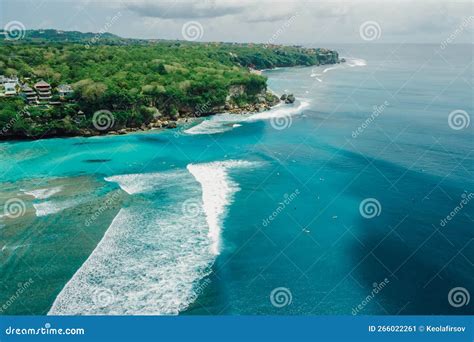 Blue Ocean With Perfect Waves And Coastline On Padang Padang Surf Spot