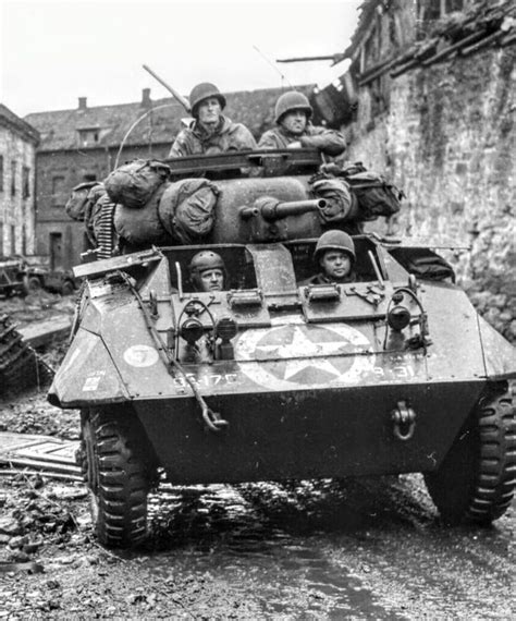 An Old Black And White Photo Of Soldiers In A Tank