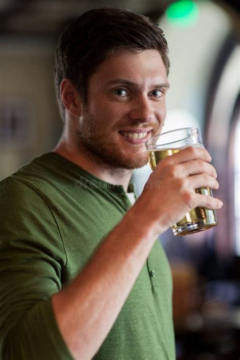 Happy Man Drinking Beer At Bar Or Pub Stock Image Image Of Light