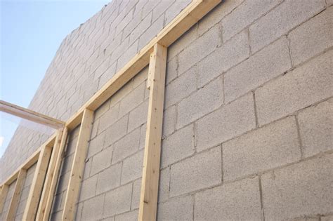 Framing Out Interior Walls Over Cinder Blocks Can Hide Them Concrete