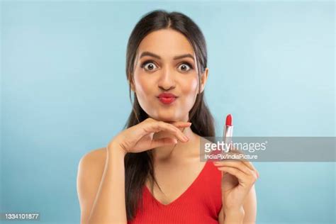 woman making kissy face photos and premium high res pictures getty images