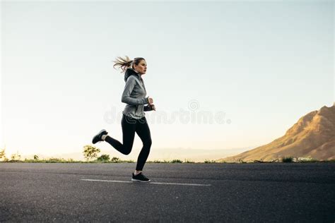 Woman Athlete Running On Road Stock Photo Image Of Space Sprinting
