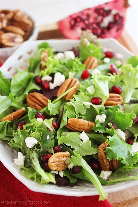 Mixed Green Salad With Pomegranate Seeds Feta And Pecans Paleo Salads Delicious Salads