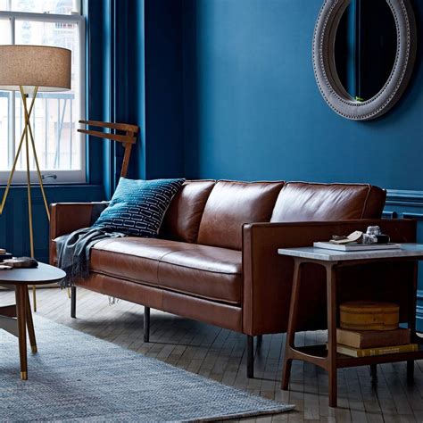 These sofas have a deep seat with comfortable back and rolled armrest. Axel Leather Sofa (226 cm) - Saddle | west elm UK