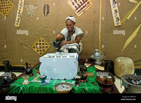 Ethiopian Woman Pours Coffee In A Traditional Coffee Ceremony Addis
