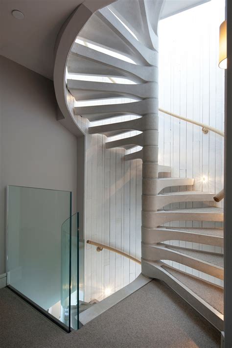 Concrete Spiral And Spine Beam Stairs Coastal Interior Design