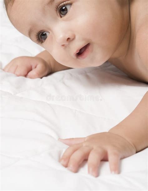 Baby Boy Lying On Bed And Thinking Stock Image Image Of Lying