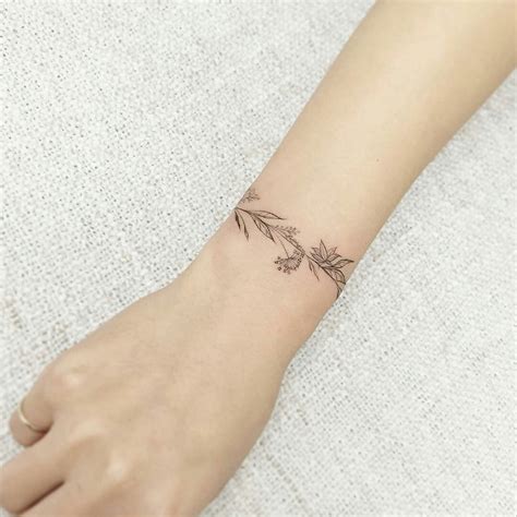 pin-by-haley-ferguson-on-tattoo-cuff-tattoo,-wrist-bracelet-tattoo,-arm-band-tattoo