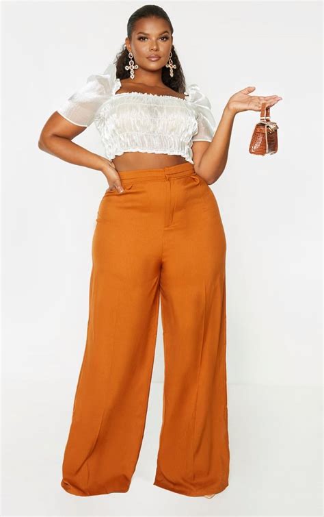 Plus Rust Woven Wide Leg Pants Prettylittlething Usa In 2020 Wide
