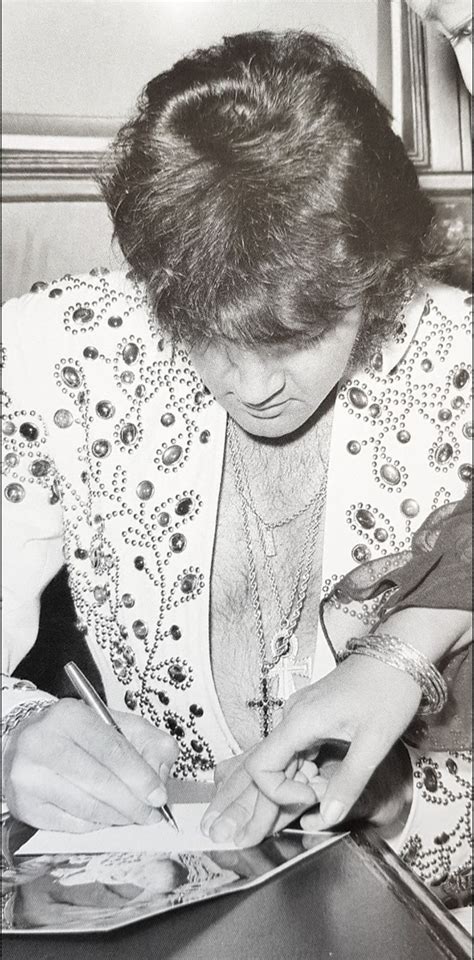 An Above View Of Elvis Signing Autographs Beautiful Voice Most