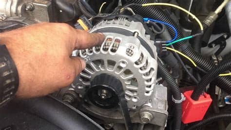 2004 chevy tahoe high output alternator install - YouTube