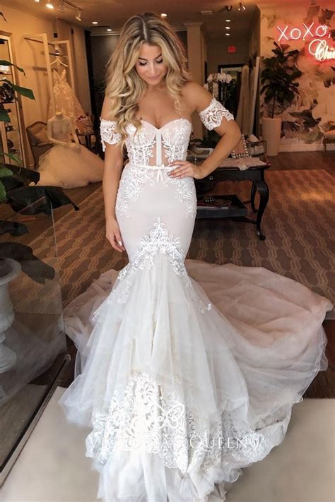If you're looking for a mermaid wedding dress, we'll help you find a gorgeous gown, at an amazing price. Separate Short Sleeve Lace & Tulle Mermaid Wedding Gown - VQ