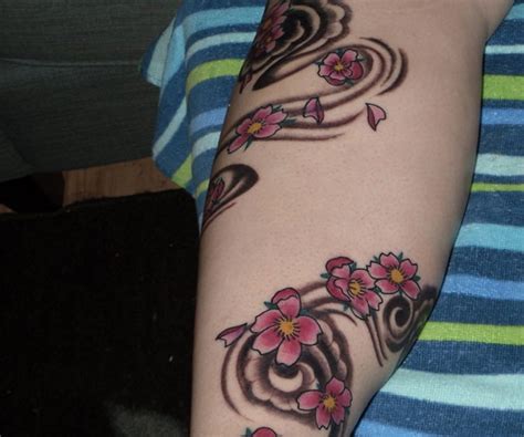 As cherry blossom tattoos are symbolic to short nature of life so it would be meaningful to add joy to them such as butterflies. 25 Amazing Japanese Cherry Blossom Tattoo Designs - SloDive