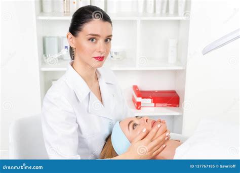 Female Beautician Doctor With Patient In Wellness Center Professional