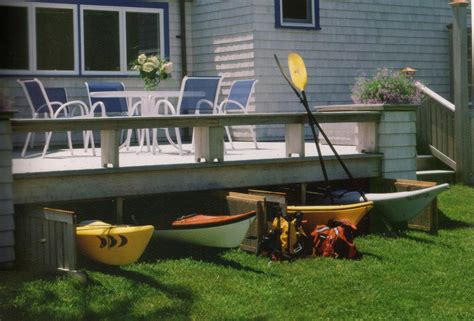 Deck With Underneath Storage For Kayaks Cabin Design Kayak Storage