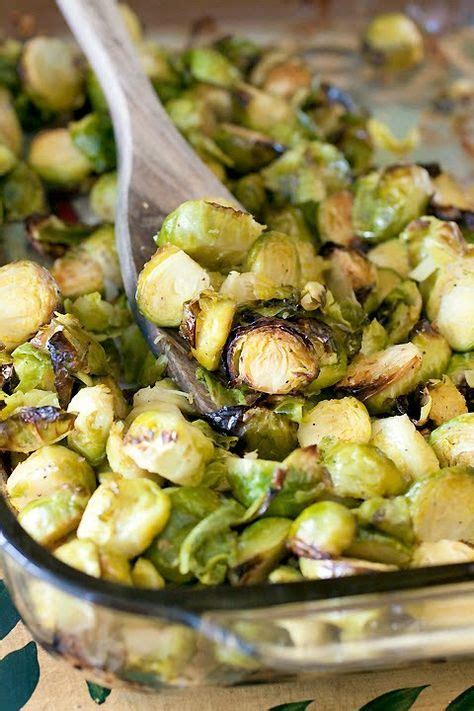 Wash and cut brussels sprouts in half. The Cooking Photographer: Oven Roasted Garlic Brussels Sprouts | Recipes, Food, Vegetable recipes