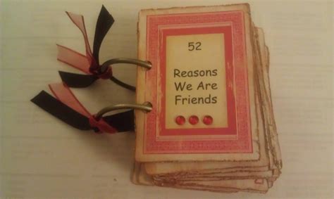 An Old Book With Ribbon Attached To It That Says 52 Reasons We Are Friends