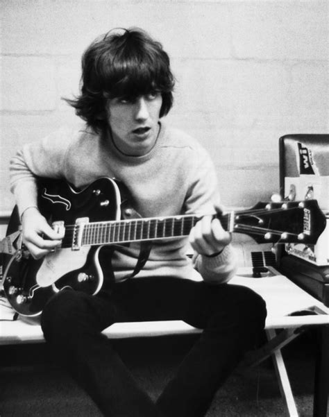 George Harrison Playing His Guitar #HappyBirthday Ringo Starr, George