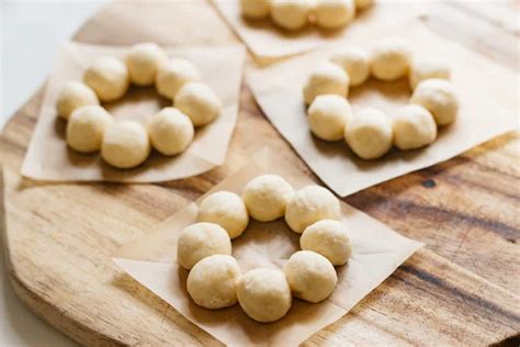 The best way is to cut pieces of parchment paper which makes it easier to form the cute shape and keep the form when frying. Mochi Donut : Pon-de-Ring | Chopstick Chronicles