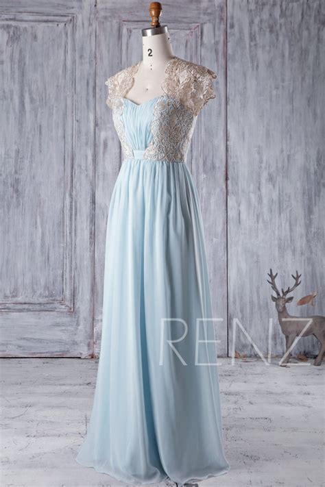 This pretty pastel dress is our pick this pale blue dress is an endlessly glamorous choice for a winter wedding. Bridesmaid Dress Light Blue Chiffon Gold Lace Maxi Dress ...