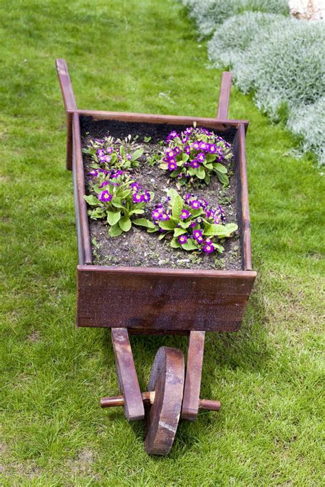 27 Wheelbarrow Flower Planter Ideas For Your Yard Zugnews