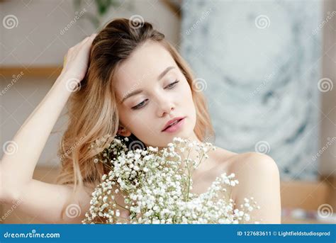 Sensual Naked Woman With Closed Eyes Wearing Golden Headpiece Royalty