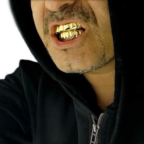Why Do Rappers Wear Gold Teeth Live Enhanced