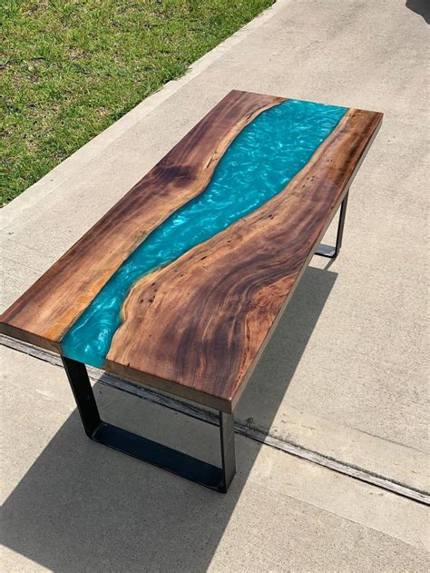 This Blue River Epoxy Table Is Made To Look Like A Satellite View Of Earth