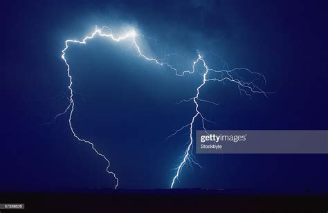 View Off A Bolt Of Lightning Hitting The Ground High Res Stock Photo
