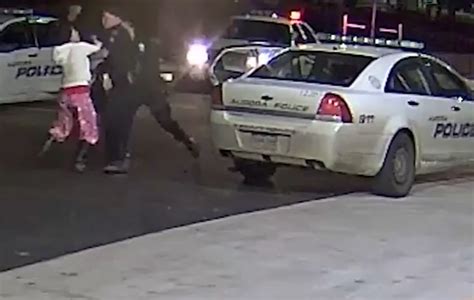 Watch Woman Suing 3 Aurora Police Officers After Being Slammed To Ground And Choked Filming Cops