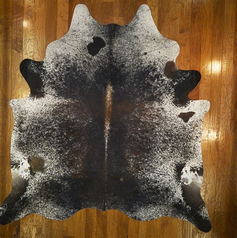 You have to ensure that you clean in the direction of the rug's hairs. Longhorn Cowhide Rug: AA5168 - Cowhide Warehouse