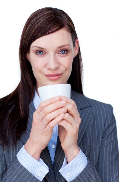 Premium Photo Portrait Of An Attractive Businesswoman Drinking A Coffee