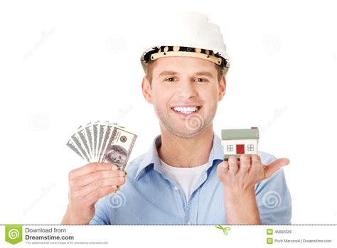 Construction Man Holding House Model And Money Stock Image Image Of