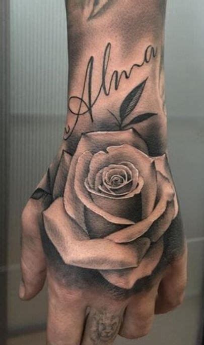 Name Above Rose Tat Hand Tattoos For Guys Rose Tattoos For Men