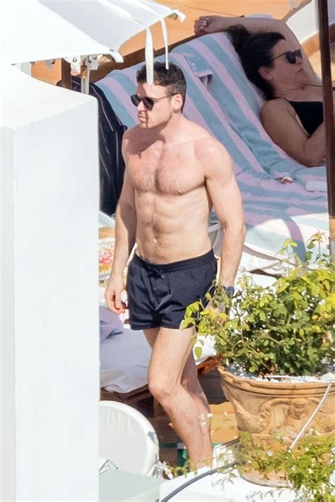 Chris Hemsworths Model Actress Ex Wears A Red Bikini In Australia