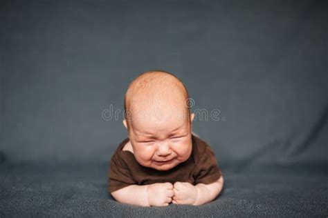 Newborn Baby Boy Crying The Caucasian Child Is Lying Stock Photo