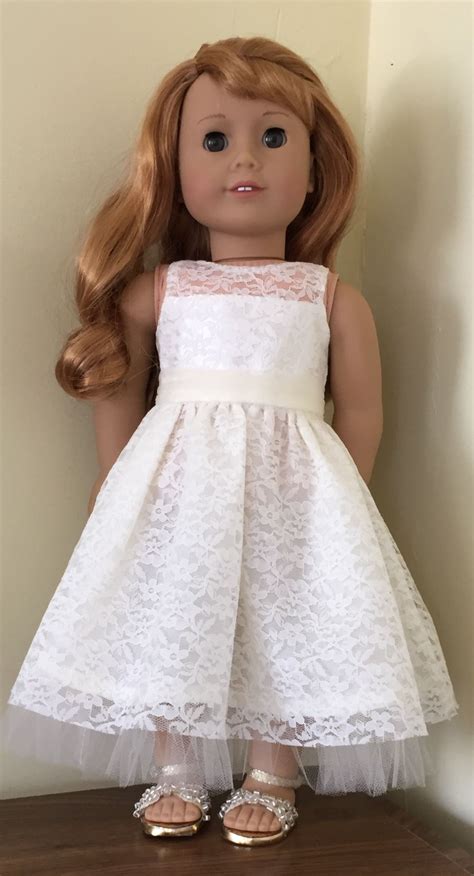 flower girl t a dress for her doll to match hers