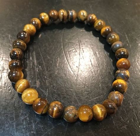 Maybe you would like to learn more about one of these? Tigers Eye Bracelet (Elastic Bracelet) | Crystal healing ...