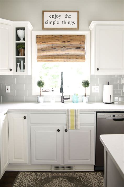 There are 10 references cited in this article, which can be. modern farmhouse kitchen with grey subway tile backsplash ...
