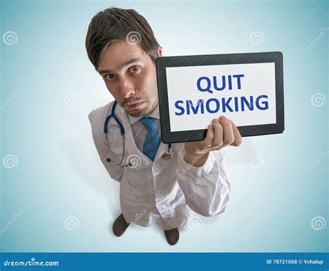 Doctor Is Giving Advice To Quit Smoking View From Top Stock Photo