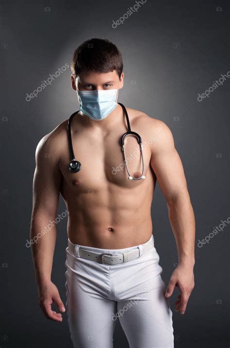 Seksowny tancerz w kostium lekarza z stetoskop Zdjęcie stockowe
