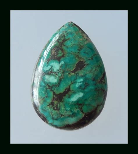 Natural Turquoise Cabochon Gemstone 38x25x5 Mm