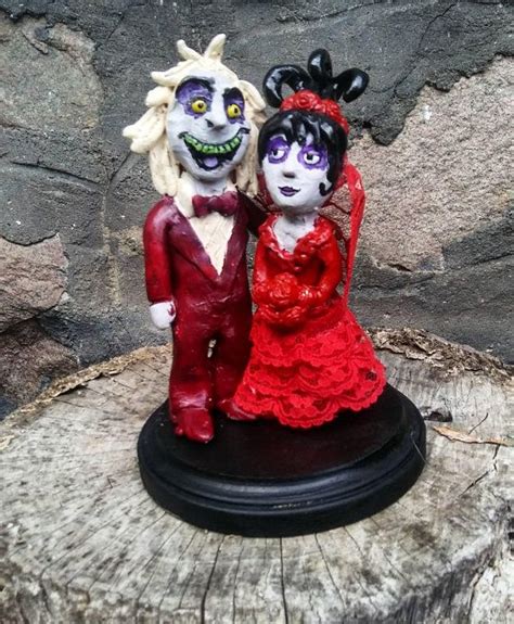 Beetlejuice and lydia cake topper sculpted by artist christina patterson from www.idocaketoppers.com. Beetlejuice and Lydia Cake Topper. Custom made from ...