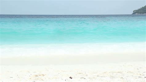 White Sandy Beach Lazy Waves Of Crystal Clear Beautiful Blue Water