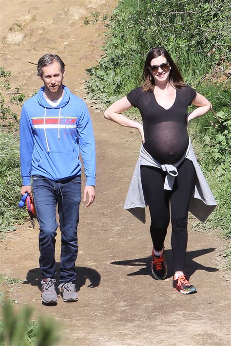 Ready To Pop Anne Hathaway Exposes Her Very Pregnant Belly In A Sheer Top