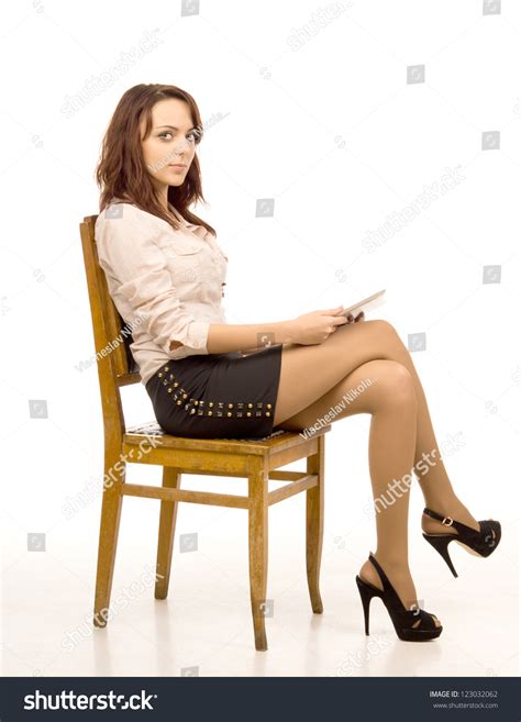 Attractive Woman Crossed Legs Sitting On Stock Photo Edit Now 123032062