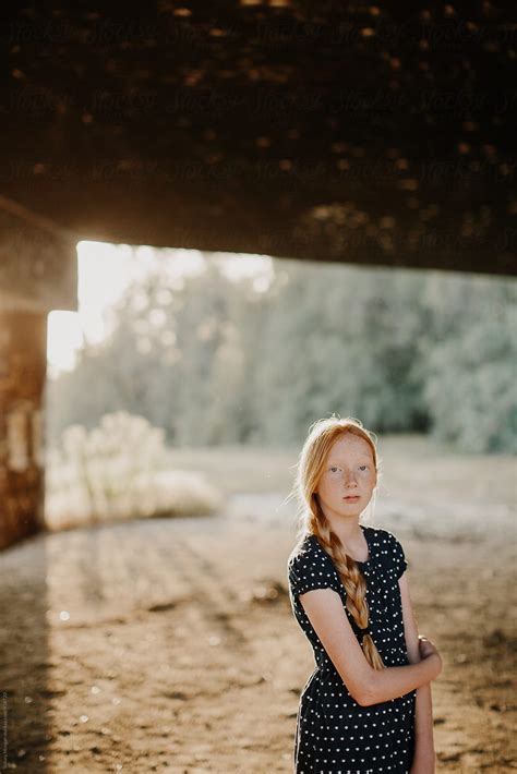 Young Girl Under Bridge By Stocksy Contributor Sidney Scheinberg