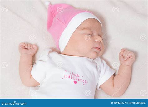 Cute Small And Adorable Newborn Baby Girl Sleeping Stock Image