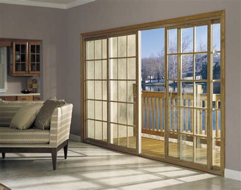 Four Panel Sliding Glass Door In With Sqaure Grids Creates A Timeless